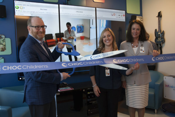 Dr. Leonard Sender, medical director of CHOC Children's Hyundai Cancer Institute, Kara Noskoff, CHOC child life specialist and Kimberly Chavalas Cripe, CHOC president and chief executive officer celebrate the opening of the inpatient infusionarium and lounge. 